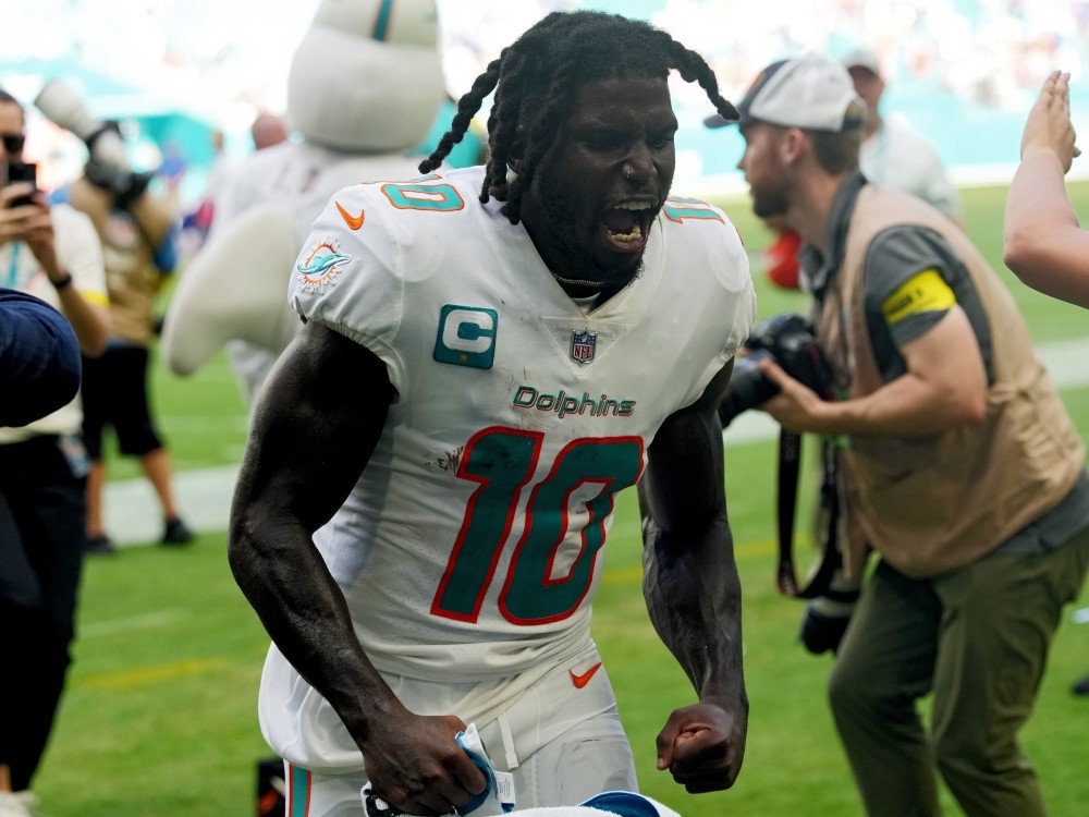 Wide receiver Tyreek Hill of the Miami Dolphins celebrates after his team beat the Buffalo Bills during a game in 2022.