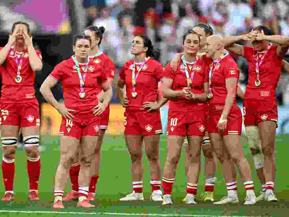 Alysha Corrigan, Julia Schell, Taylor Perry, Taylor Perry and Olivia Apps of Canada look dejected after defeat to England during the Women's Rugby World Cup 2025 Final.