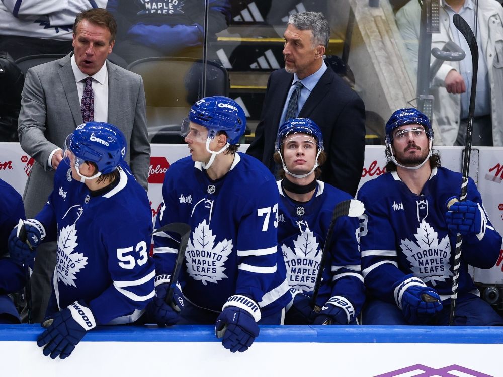 Gavin McKenna of the Toronto Maple Leafs looks on from the bench during the third period against the Buffalo Sabres.