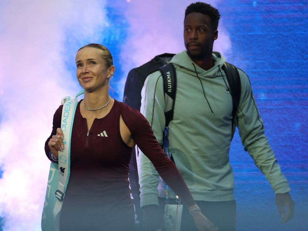 Gael Monfils and Elina Svitolina walk onto the court prior to their Mixed Doubles Semifinal at this year’s U.S. Open against Belinda Bencic and Flavio Cobolli.