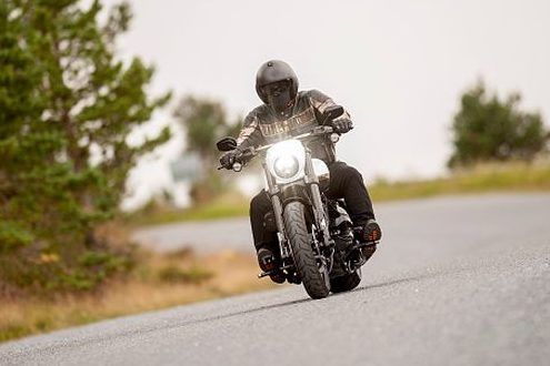 Brandon Woodbury crashed a stolen motorcycle in 2022, then tried to flee police. Photo illustration