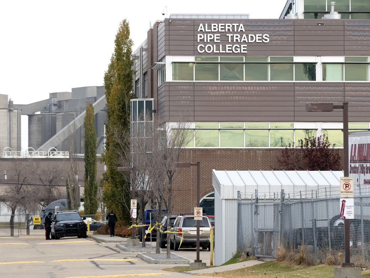 Police work outside the Alberta Pipe Trades College located at 16107 121A Avenue, after a reported shooting in Edmonton on Friday Oct. 16, 2026.