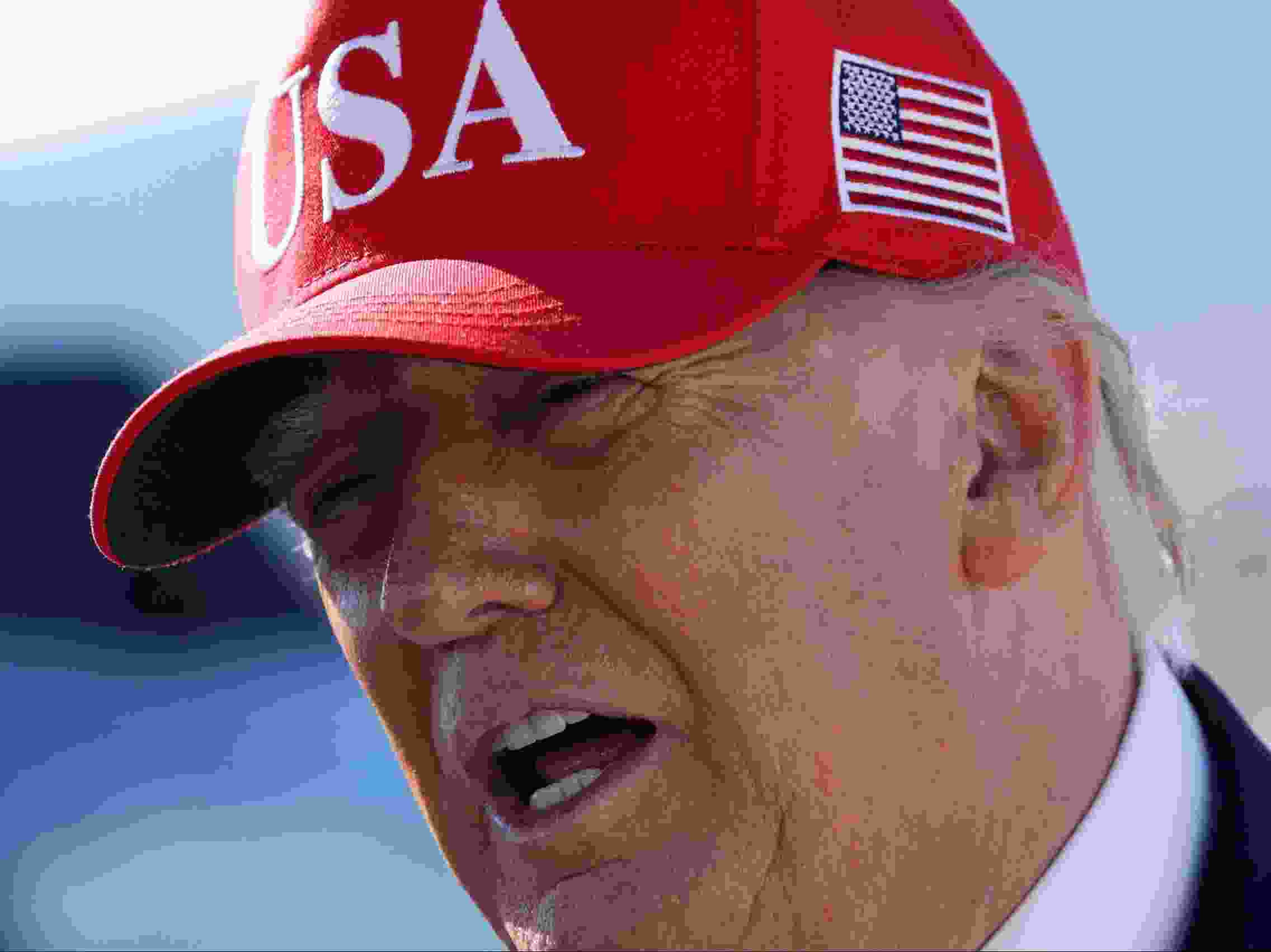 U.S. President Donald Trump speaks to members of the media before boarding Air Force One as he departs Laughlin/Bullhead International Airport following a rally on Wednesday, Oct. 14, 2026, in Bullhead City, Ariz. Trump is traveling to Arizona and Montana to campaign for Republican candidates ahead of the midterm elections.