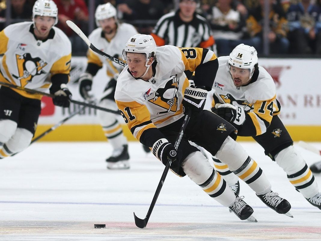 Ben Kindel of the Pittsburgh Penguins skates with the puck during the first period of an NHL game against the Vegas Golden Knights.