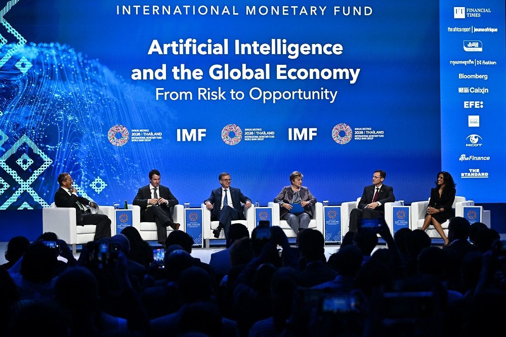 (Left to right) CNN presenter Richard Quest, Co-founder and Head of Public Benefit of Anthropic Jack Clark, Bank of Canada Governor Tiff Macklem, IMF Managing Director Kristalina Georgieva, DHL Group CEO Tobias Meyer and CEO of Addo AI Ayesha Khanna converse during the AI and the Global Economy: From Risk to Opportunity panel at the Annual Meetings of the International Monetary Fund (IMF) and the World Bank Group (WBG) at the Queen Sirikit National Convention Center (QSNCC) in Bangkok on October 16, 2026.