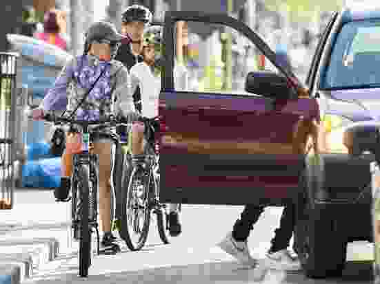 Cyclists on eastbound bike lanes along Bloor St. W. near Ossington Ave. in Toronto. On Tuesday, the dismantling of bike lanes along Bloor St. in Etobicoke will begin.