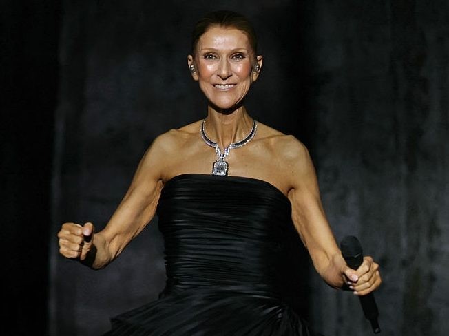 Canadian singer Celine Dion reacts as she performs during her first concert of a series at the Plenitude Arena in Nanterre, west of Paris on September 12, 2026.