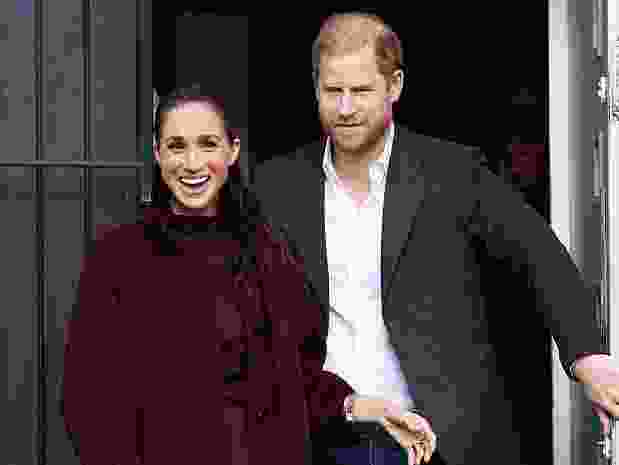 Britain's Prince Harry, Duke of Sussex and his wife Meghan, Duchess of Sussex, react after they visit to the Community Recording Studio (CRS) in Nottingham, central England on October 15, 2026.