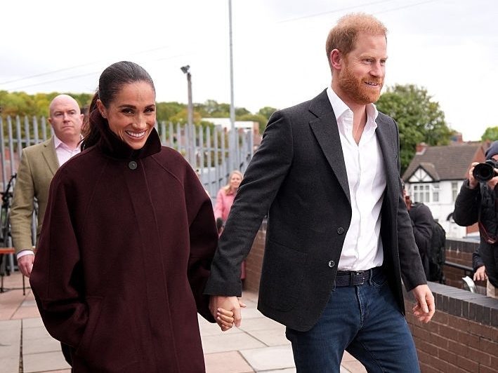 Britain's Prince Harry, Duke of Sussex and his wife Meghan, Duchess of Sussex, leave after a visit to Epic Partners in Nottingham, central England on October 15, 2026.