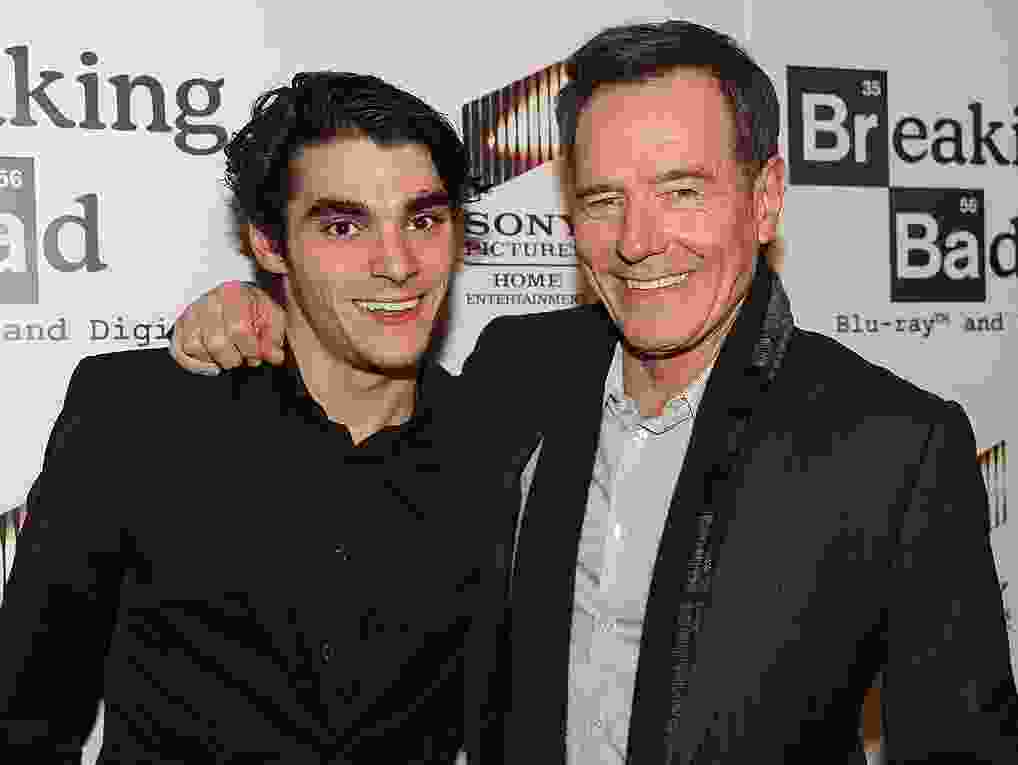 Actors RJ Mitte (L) and Bryan Cranston arrive at the screening of 
