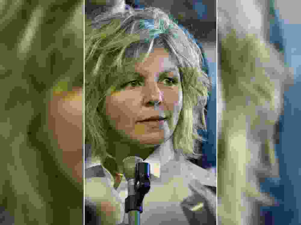 Crown prosecutor, Catherine Murray talks to the media outside B.C. Supreme Court in Vancouver July 18, 2004.