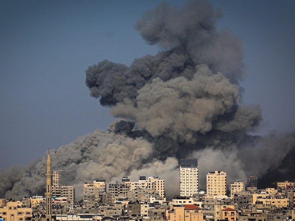 Smoke billows during Israeli air strikes in Gaza City