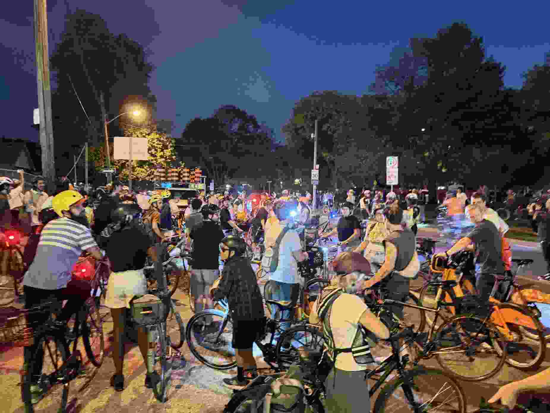 Cyclists gather in the area of Bloor St. W. and Islington Ave.