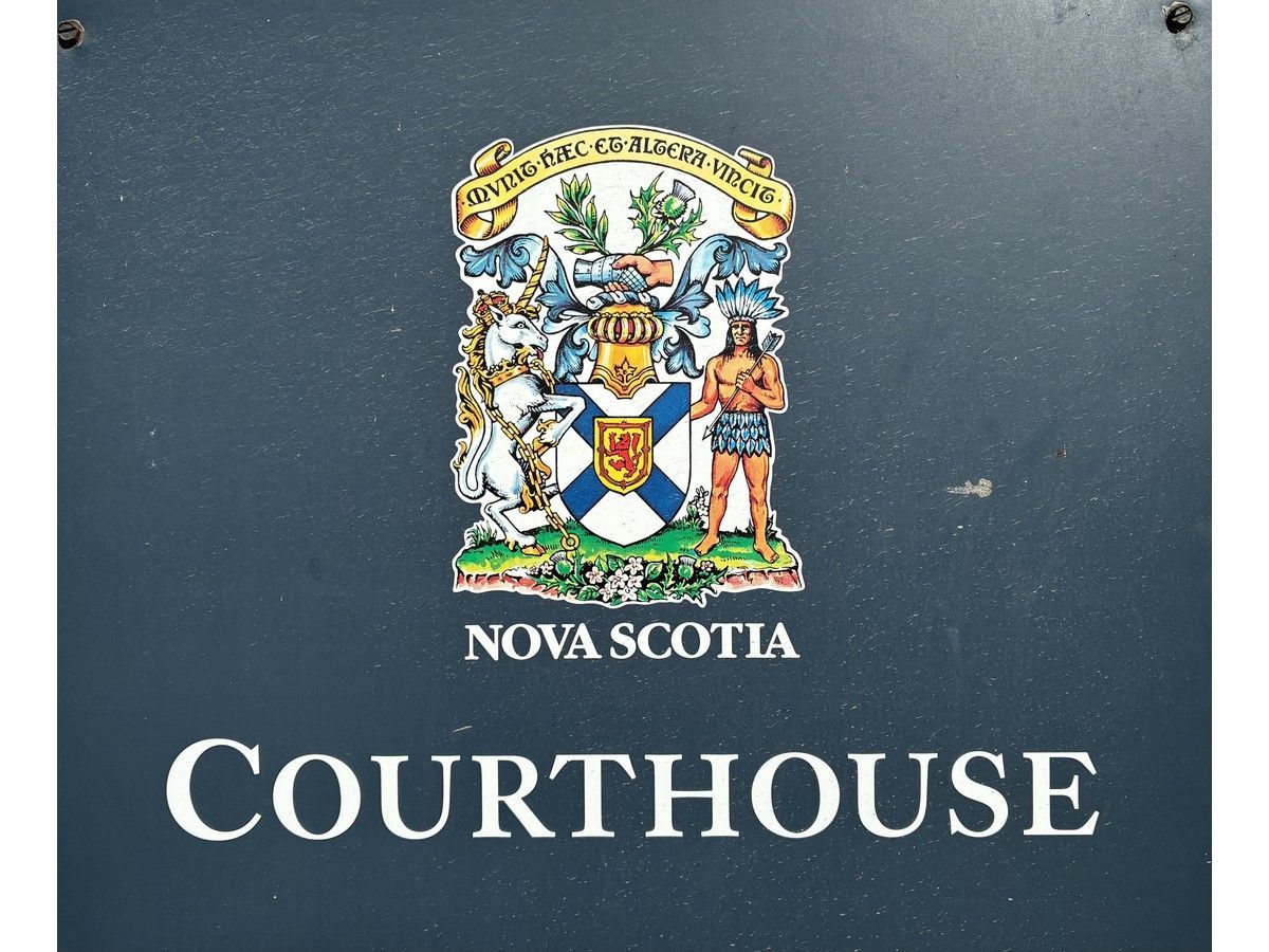 A Cape Breton man who assaulted a woman with a box cutter and used bear spray to rob a liquor store has been sentenced to more than three years in prison.