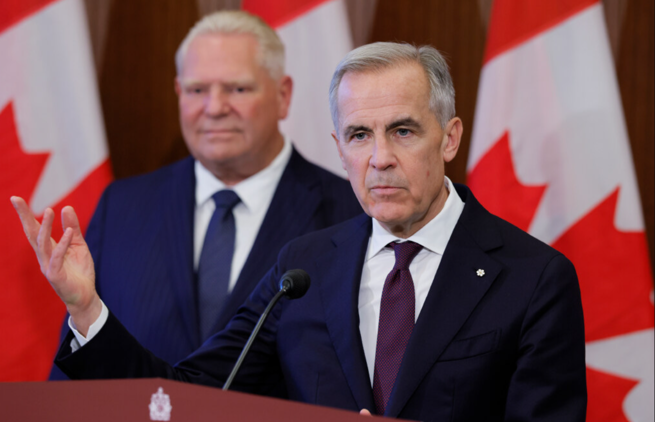 Prime Minister Mark Carney and Ontario Premier Doug Ford take part in a news conference on Parliament Hill in Ottawa on Oct. 21, 2026. (Blair Gable/Postmedia)