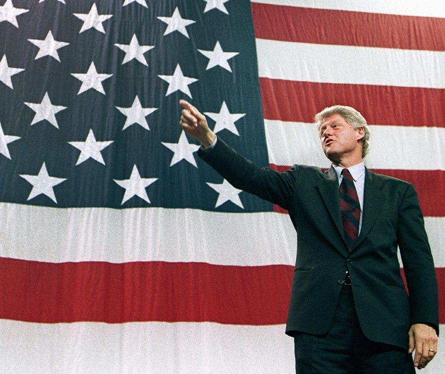 Democratic presidential candidate Bill Clinton in a file phot from Oct. 28, 1992 in Louisville points to the crowd during a campaign stop.