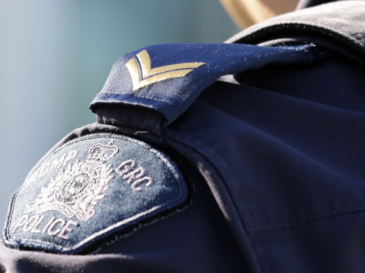 A woman has been arrested following an altercation in a Langley parking lot with a driving instructor.