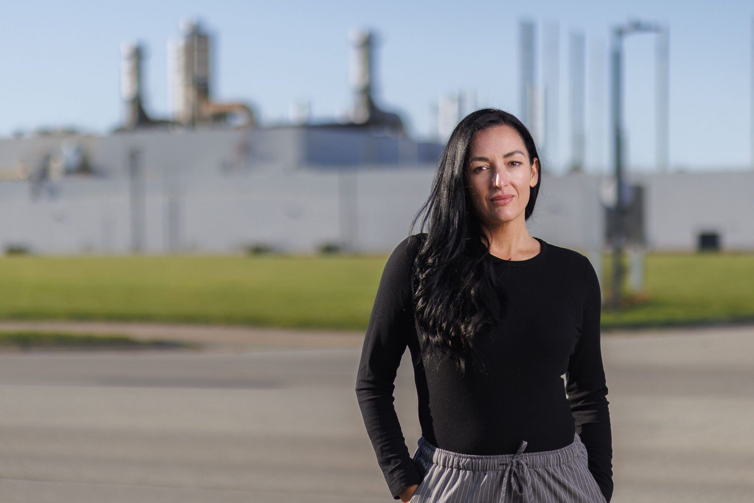 Longtime CAMI autoworker Peggy Falkingham stands in front of the shuttered plant in Ingersoll on Monday, Oct. 19, 2026. (Geoff Robins/The London Free Press)