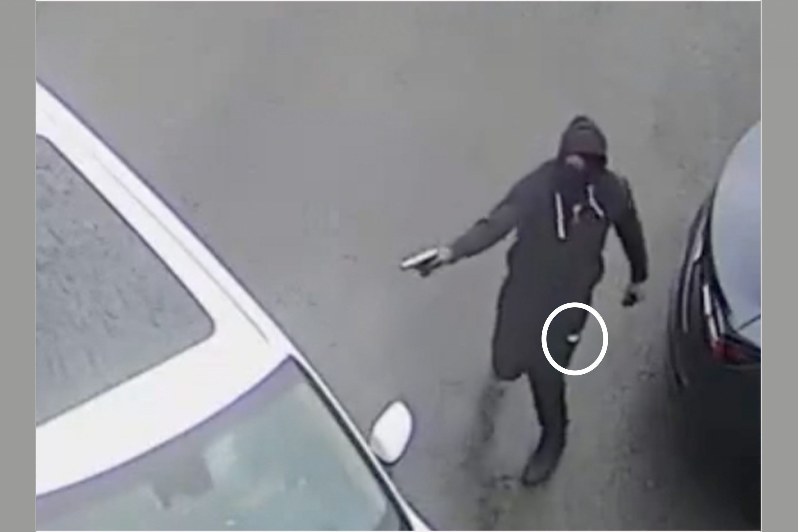 A shooter aims at Claudia Iacono's car outside her salon on Jean-Talon St. W. in Côte-des-Neiges on May 16, 2023. Two police officers testified Monday that they searched Joel Richard Clarke's home in Brampton, Ont. looking for a pair of black jogging pants with a white Puma logo on them. One police officer said a Puma logo was seen on the shooter's pants (inset) in the surveillance video. The police did find a pair of pants with the logo in Clarke's bedroom. They also found a sock with bullets stuffed in it.